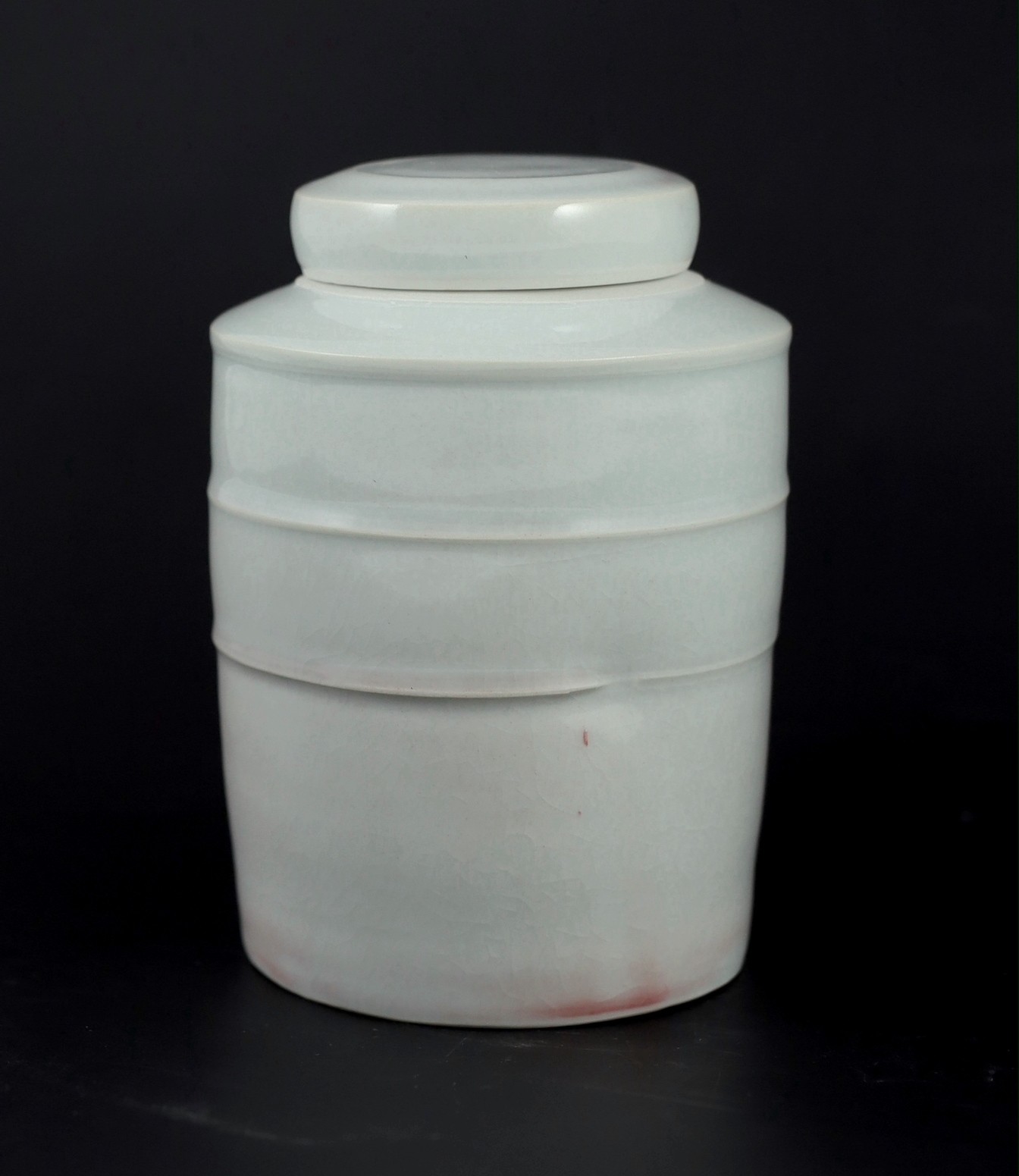 Edmund de Waal (b.1964) a banded cylinder porcelain lidded jar, c.1993, 15.5 cm high